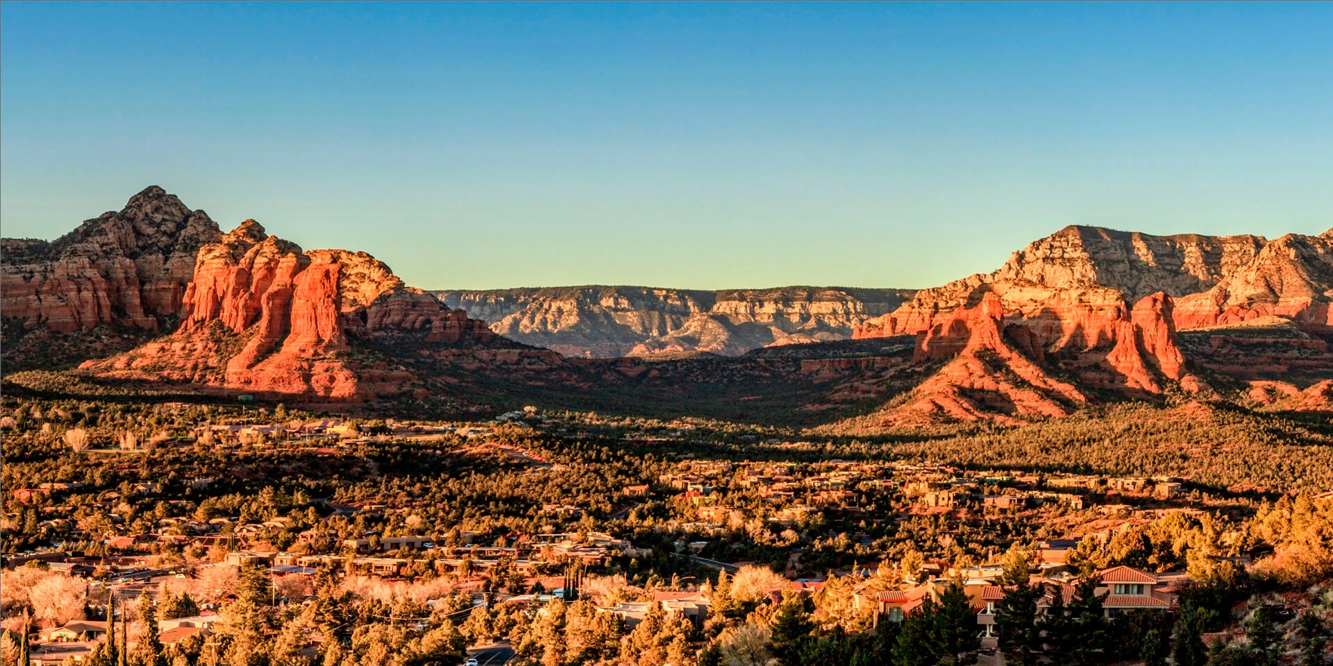 A skyline view of the red rock formations and canyons.