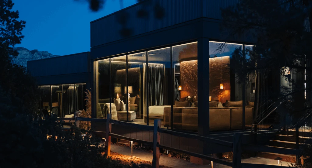 A private glass atrium at Ambiente during dusk hours.