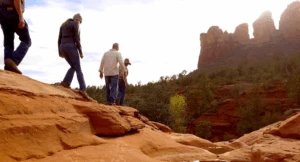 A group of people hiking throughout Sedona Arizona