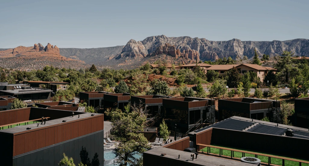 Rooftops of Ambiente overlooking the red rock Sedona landscape.