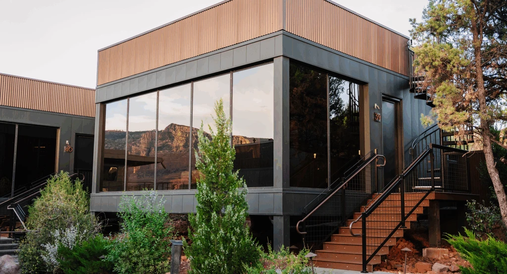 Private atrium suite at Ambiente overlooking red rock landscapes.
