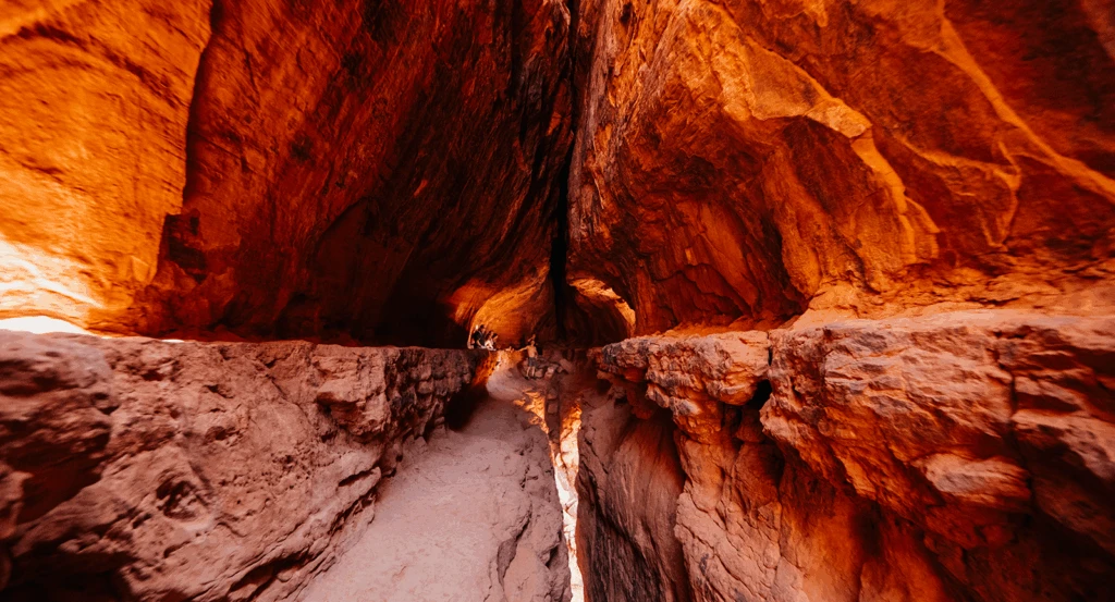 Interior of red rock caves to explore on a 4-day Sedona itinerary.