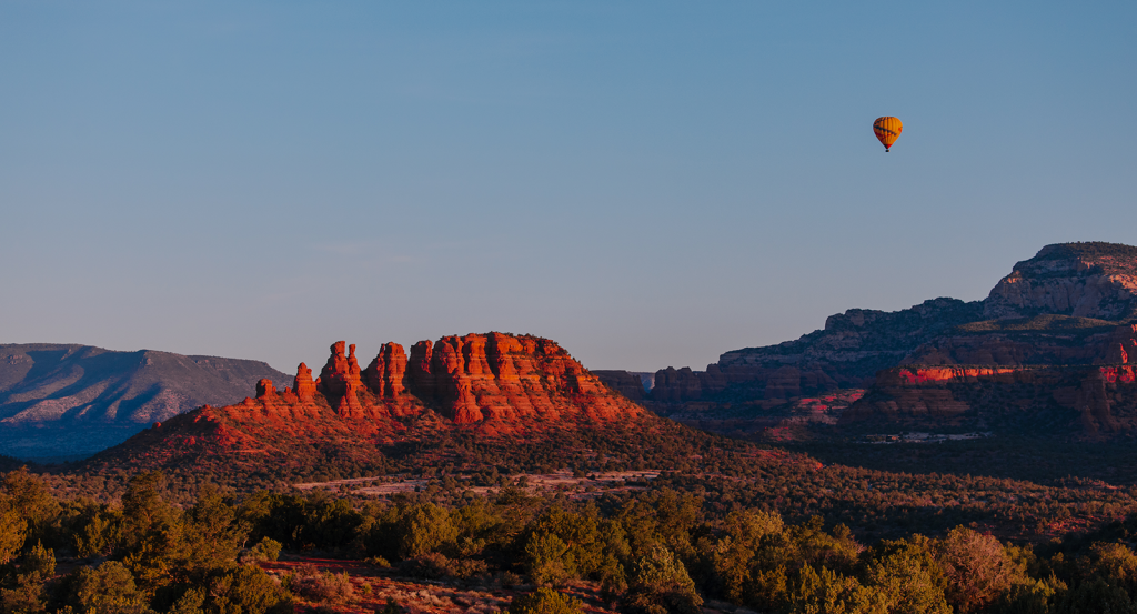 Sedona red rocks with a hot air balloon, showing winter in Arizona
